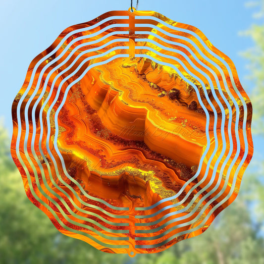 Wind spinner design with orange and yellow wavy pattern, geode pattern