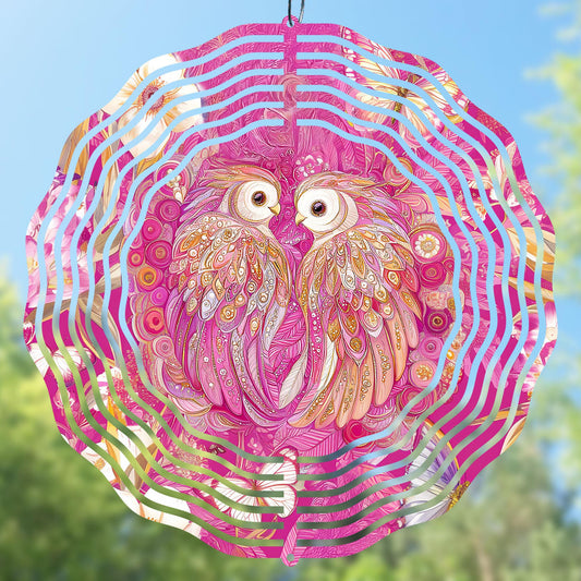 Stylish pink gold owl wind spinner design, suitable for creative projects and custom items.  