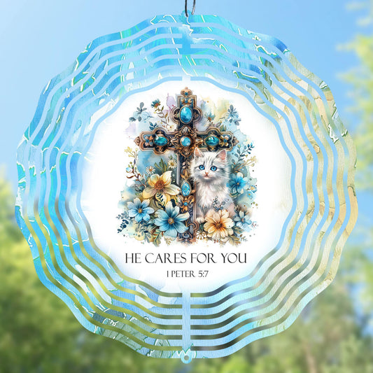 Wind spinner design with a cross, flowers, and a cat, featuring the text 'He Cares For You' and '1 Peter 5:7'.