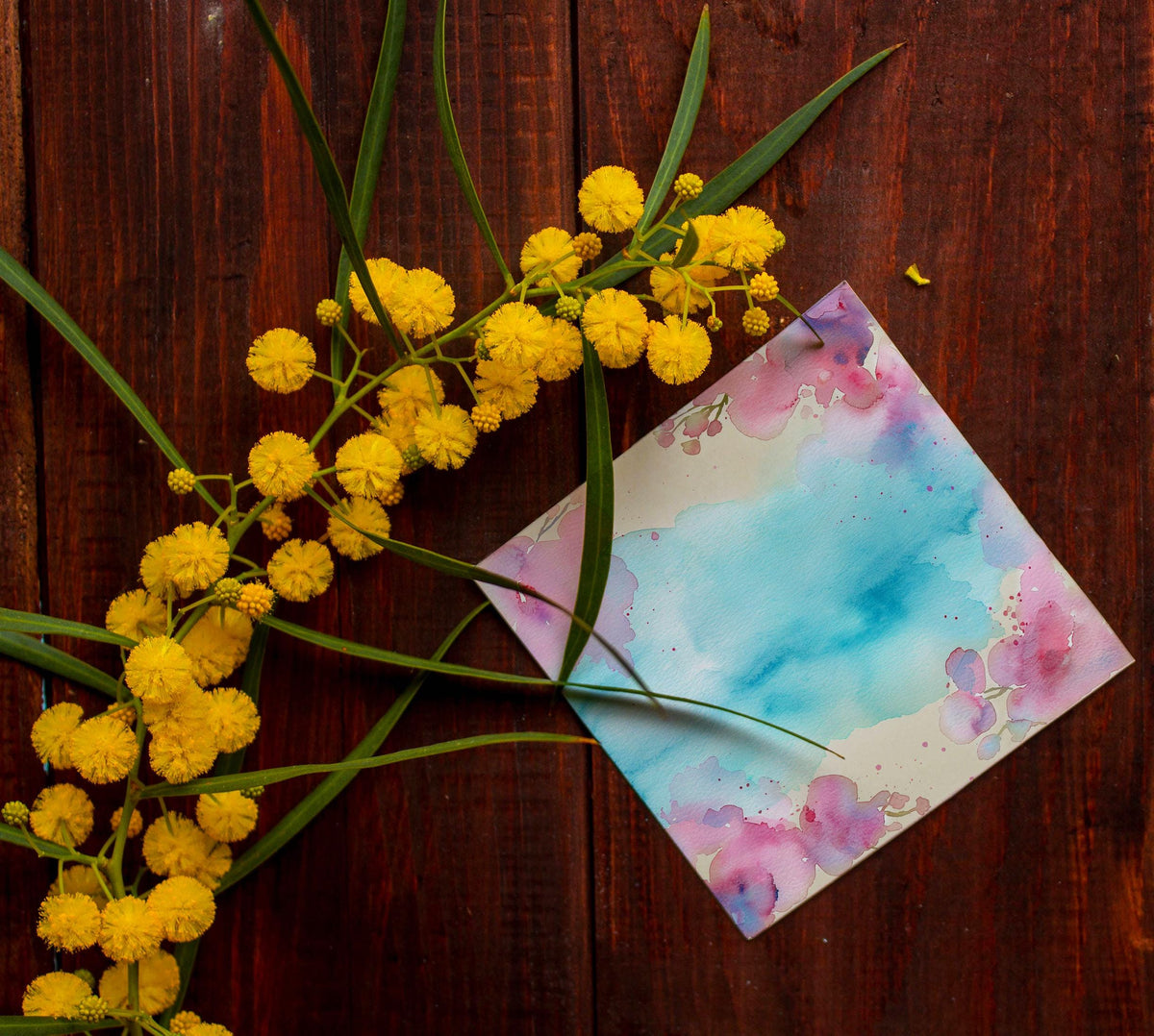 Pink Floral Watercolor Background with Aqua Center